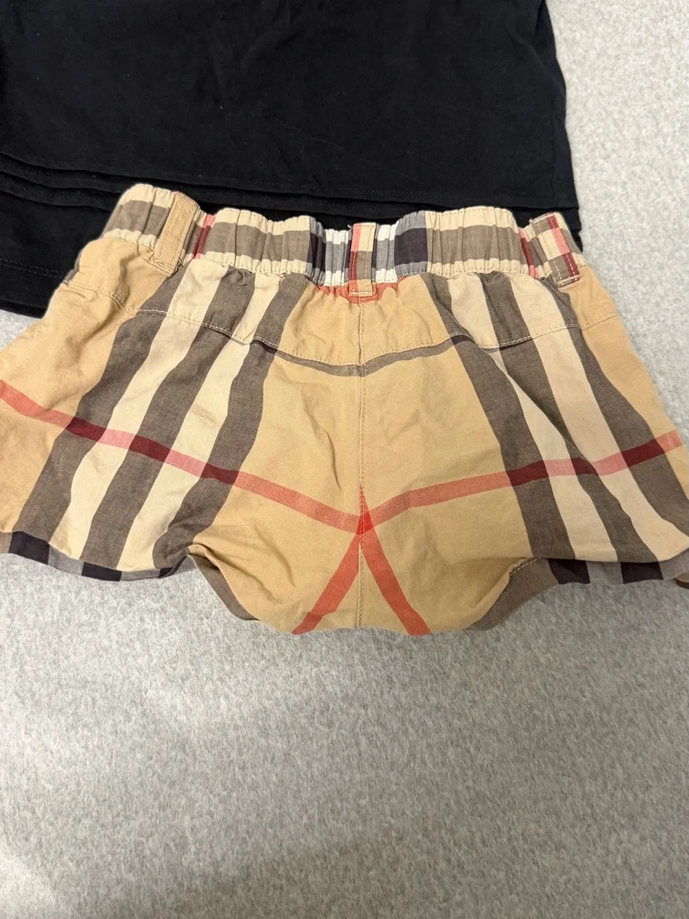 Burberry Black Top with Tan Plaid Shorts